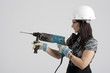 Foto: Frau mit Bohrmaschine Frau mit Bohrmaschine