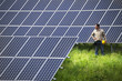 Photo: Technician at solar power station Technician at solar power station