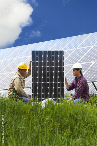 Photo: Installing Solar Panles Installing Solar Panles