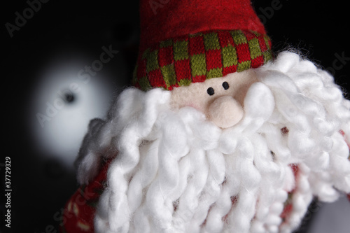 Photo: Santa claus giocattolo con sondo nero e bianco Santa claus giocattolo con sondo nero e bianco