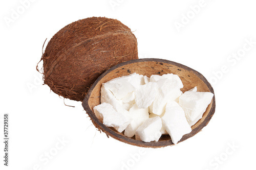 Photo: Coconut and coconut oil isolated on white Coconut and coconut oil isolated on white
