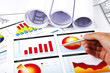 hand with the handle specifies charts of growth