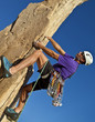 Climber gripping the rock.