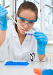Young researcher loads pcr samples