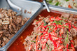 Trays of various Thai food at a market. Trays of various Thai food at a market.