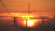 cranes and industry in a morning sunrise