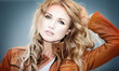 Photo: Portrait of beautiful blond woman with leather jacket Portrait of beautiful blond woman with leather jacket