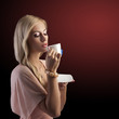 blond sensual woman with white tea cup blond sensual woman with white tea cup