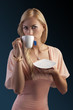 blond sensual woman with tea set blond sensual woman with tea set