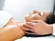 woman receiving facial massage
