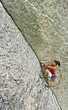 Climber gripping the rock.