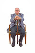 old man sitting in the armchair with his walking stick old man sitting in the armchair with his walking stick