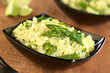 Photo: Green asparagus risotto in black bowl Green asparagus risotto in black bowl