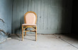 empty chair and grungy wall
