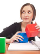 Caucasian student playing cubes on isolated white background