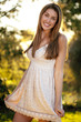 beautiful woman perfect teeth in a dress
