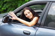 portrait beautiful young woman sitting car