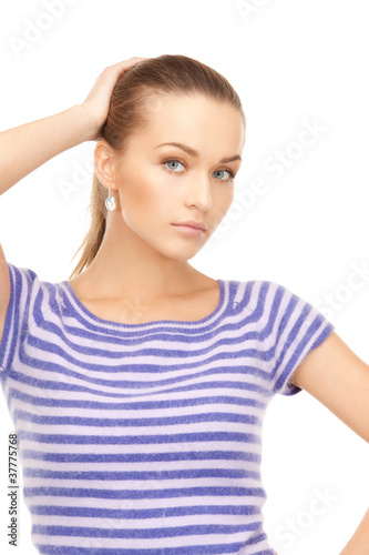 Photo: lovely woman in striped sweater lovely woman in striped sweater