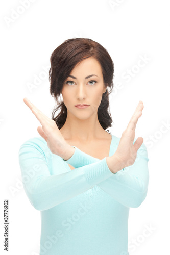 Photo: woman making stop gesture woman making stop gesture