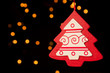 Red Christmas Tree against Light Bokeh Background Red Christmas Tree against Light Bokeh Background