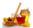 honey, lemon, honeycomb and a cup of tea isolated on white