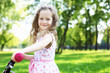 Little girl in summer park