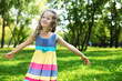 Little girl in summer park