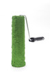 Foto: Green paint roller on white background Green paint roller on white background