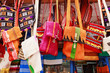 Photo: Colorful bags in a market in the street Colorful bags in a market in the street