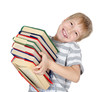 The boy reads the book isolated on white