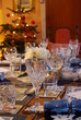 Decorated table set for Christmas dinner Decorated table set for Christmas dinner