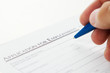 Human hand filling job application