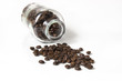 fresh dark coffee beans with bottle