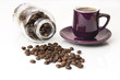 fresh dark coffee beans with bottle and cup