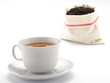 Tè nella tazza e sacchetto di tè in foglie Tè nella tazza e sacchetto di tè in foglie
