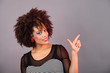 young woman pointing