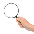 Magnifying glass in hand