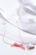 collana con fiocco rosa