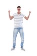 Young man celebrating success smiling