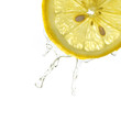 Lemon slice in water splash, isolated
