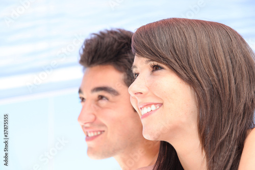 Photo: Closeup of a young couple's faces Closeup of a young couple's faces