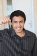 Man holding a doorkey
