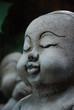 Stone children in garden Stone children in garden