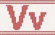 Red knitted Letter v on beige Background Red knitted Letter v on beige Background