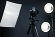 Studio background with light accessories and vintage camera
