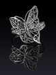 Silver ring butterfly shaped with reflection.