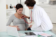 Pregnant woman at a doctor's surgery