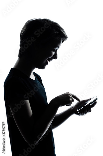 Foto: one young teenager boy or girl telephone videophone video game s one young teenager boy or girl telephone videophone video game s