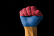 Fist painted in colors of armenia flag