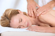 Woman enjoying a back massage